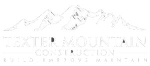 Texter Mountain Construction Logo White